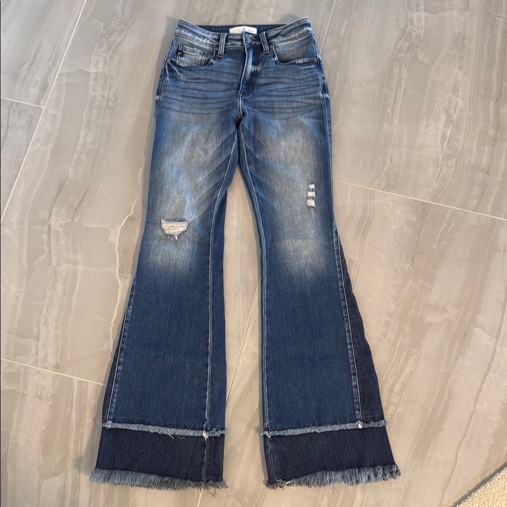 KanCan Blue Flare Jeans with Distressed Details and Raw Hem